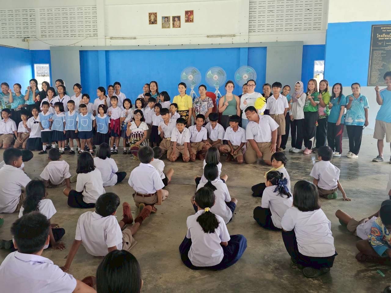 Teachers, interns, and students at Ban Nam Khem School